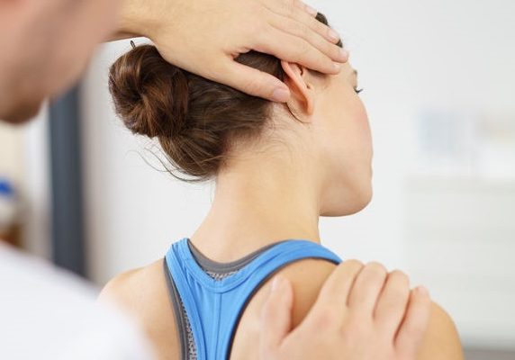 physiotherapist working on neck